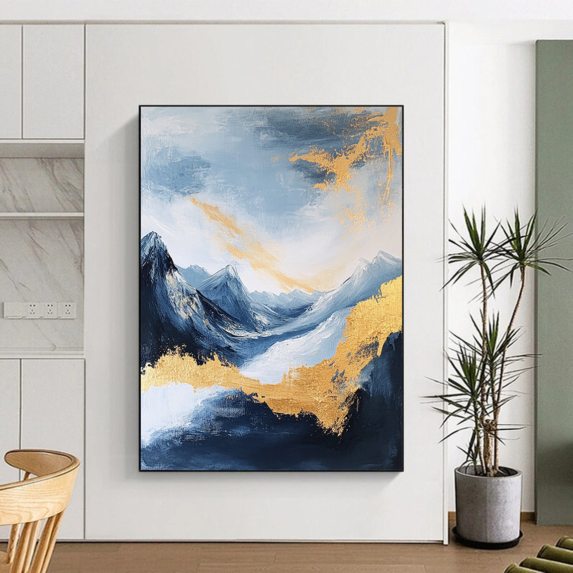 Large contemporary abstract painting featuring exquisite details of mountains clouds and sea in deep gold indigo and yellow colors against a white background DLZ0338