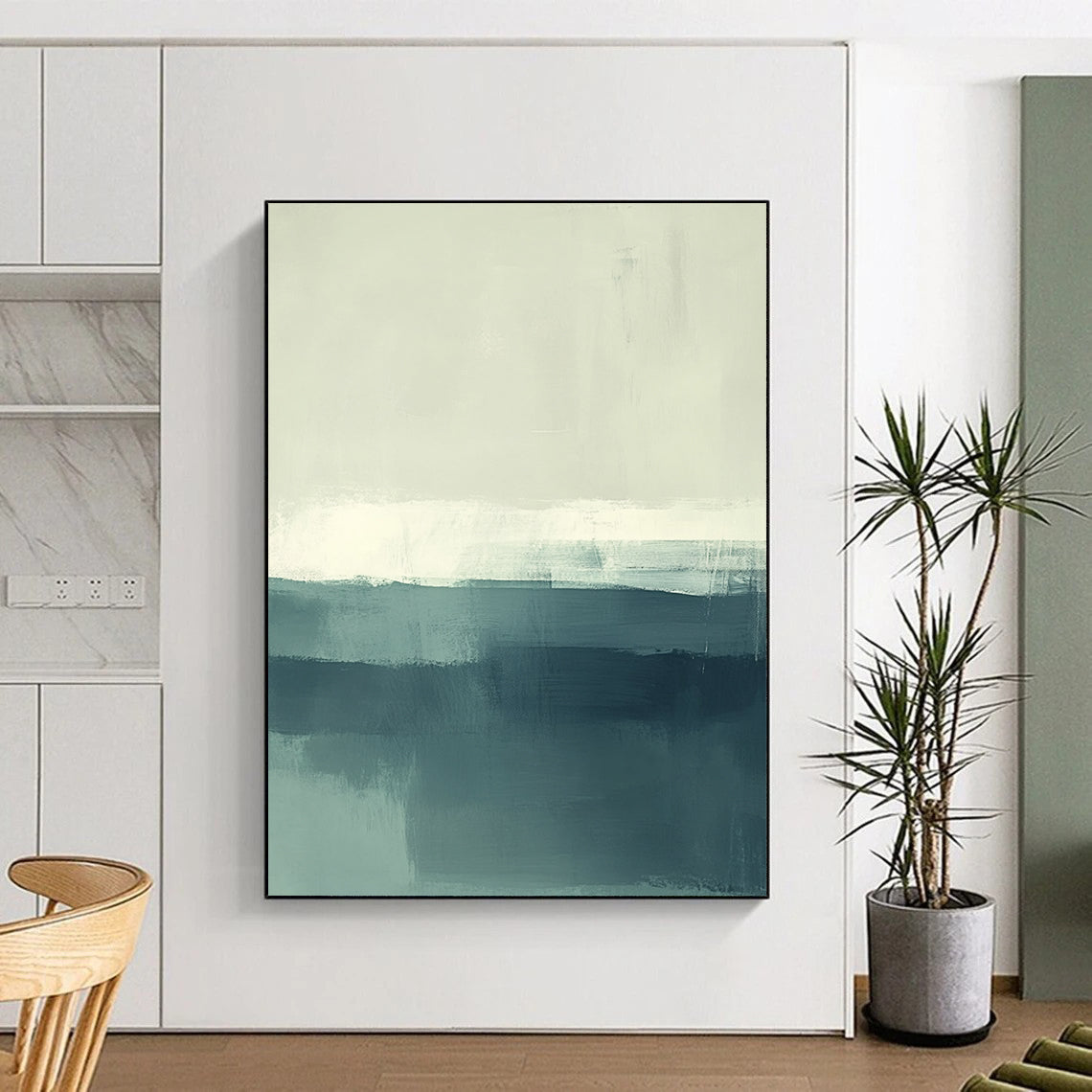 Contemporary hand-painted abstract artwork of the sea featuring soft muted teal and green tones with white accents. Perfect for modern spaces. DLZ0431