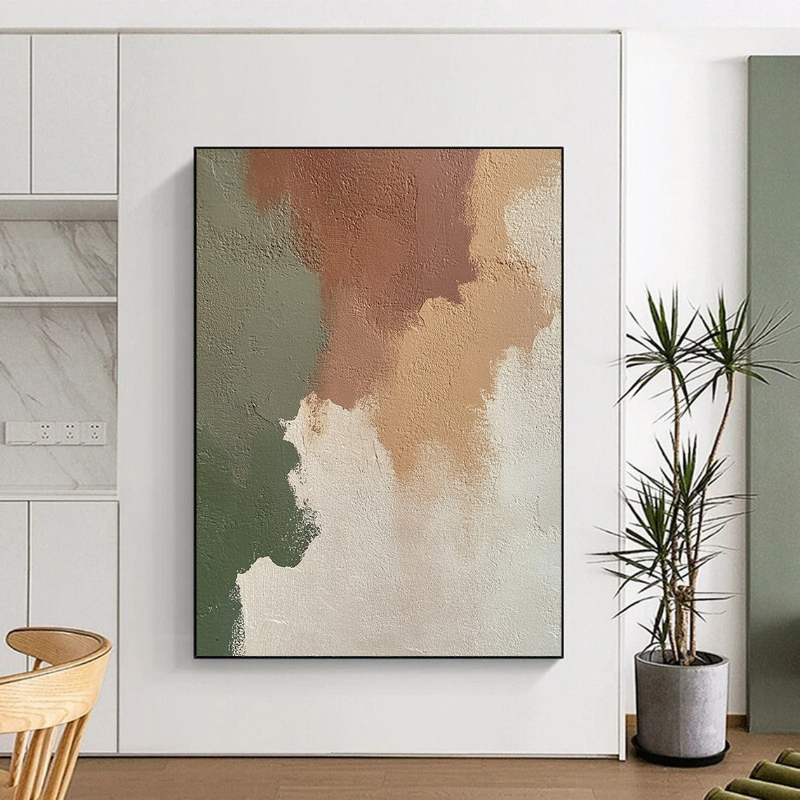Contemporary abstract artwork featuring an irregular blend of beige, brown, and green on an off-white wall, perfect for modern decor. DLZ1197