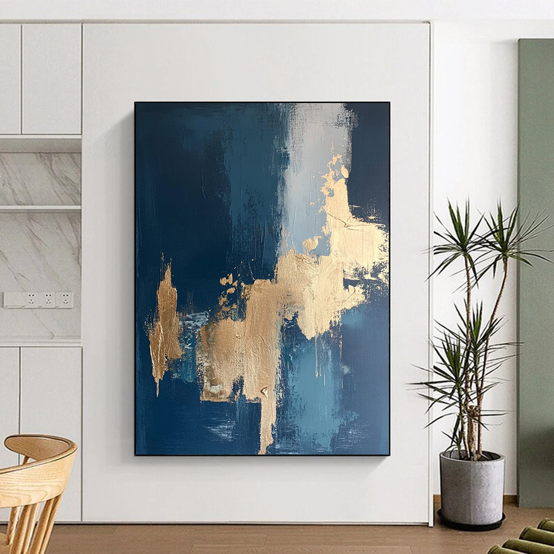Contemporary hand-painted abstract art features intricate textures with gold leaf accents on a rich dark blue canvas. DLZ0331