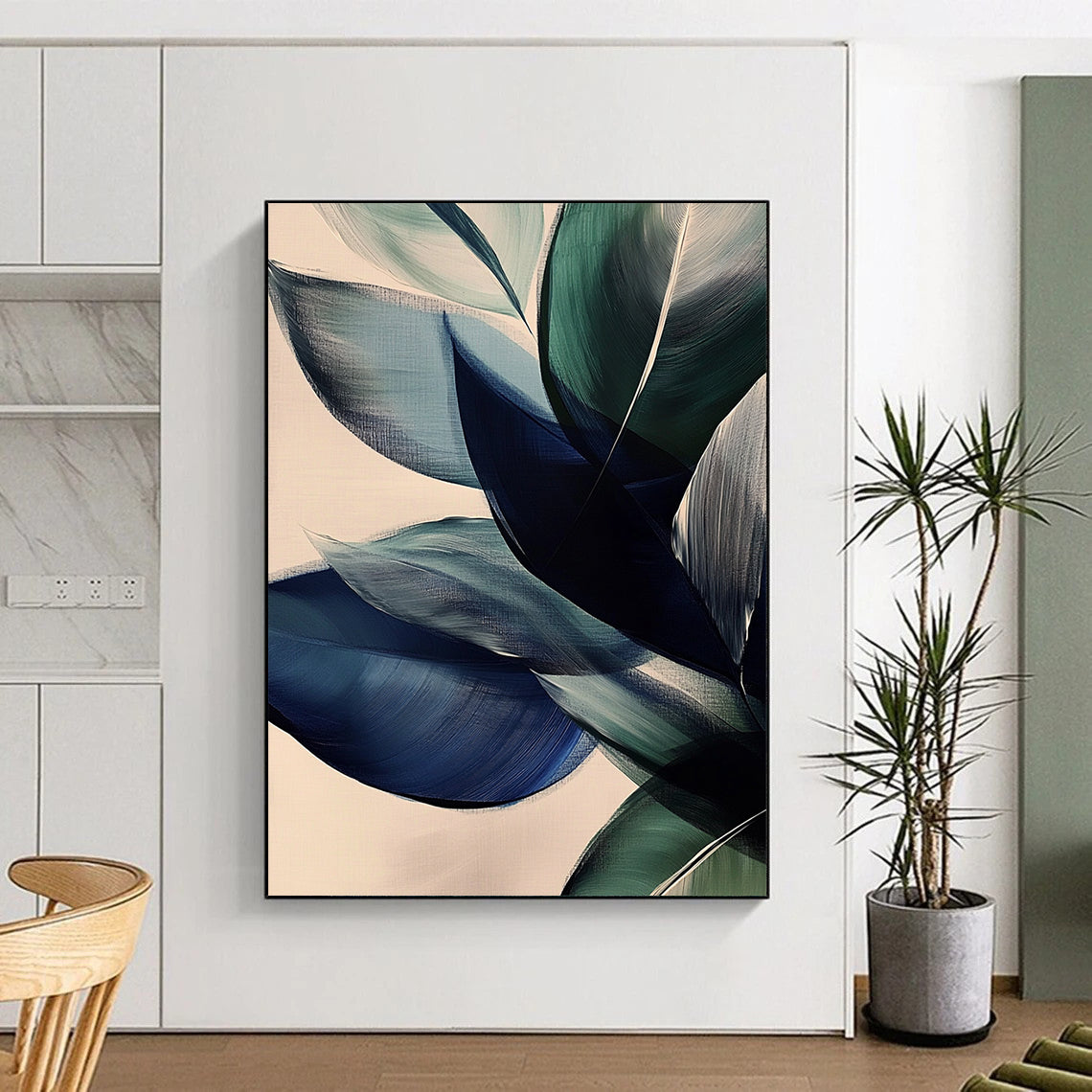 Large contemporary abstract painting featuring vibrant leaves in dark blue and green tones on a beige background with soft edges and layered forms. DLZ0625