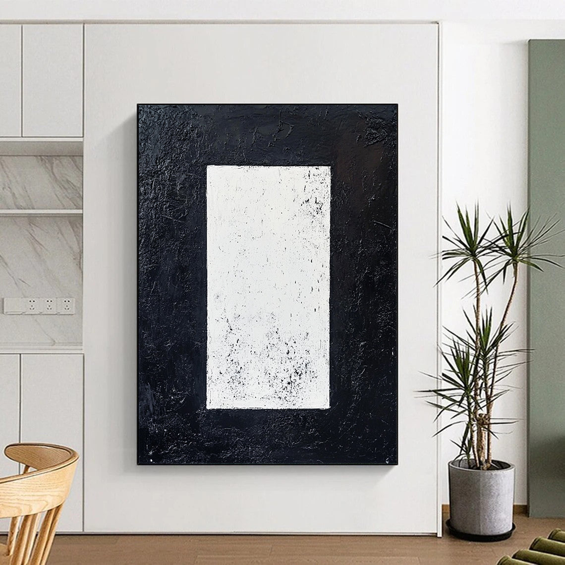 Contemporary hand-painted abstract art featuring a white rectangle on a textured black background creating a striking minimalist monochrome effect. DLZ1520