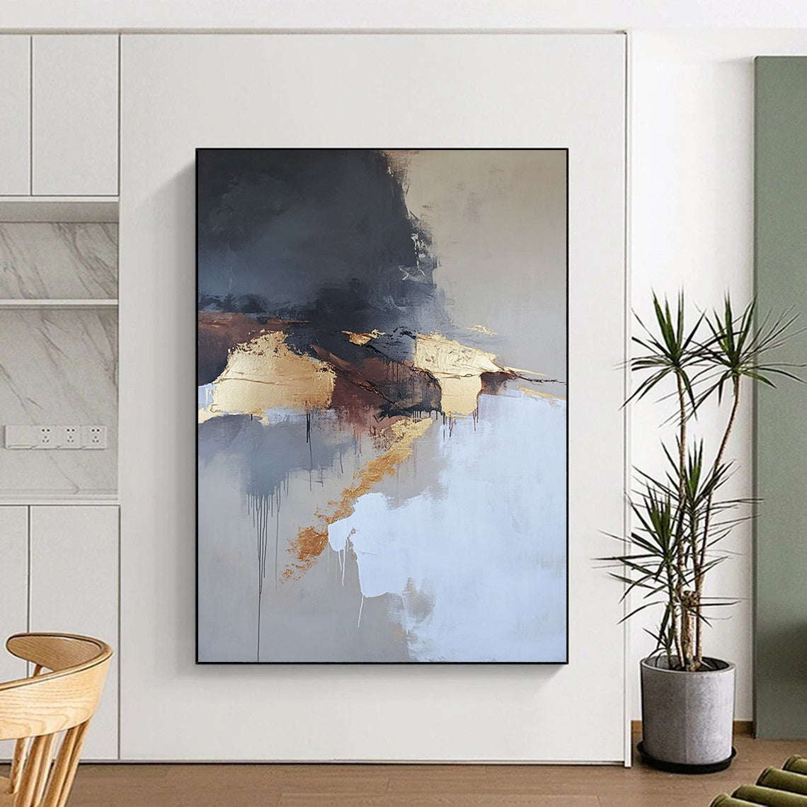 Contemporary abstract painting features aerial views with dark gray and white clouds gold elements in beige tones and thick brush strokes. DLZ0448