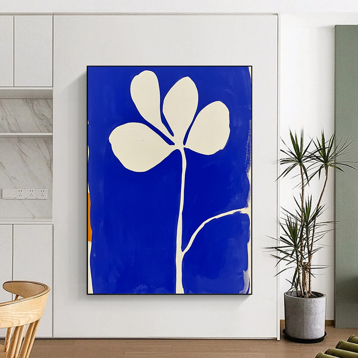 Large contemporary abstract painting featuring blue and white minimalist flower shapes in the style of Matisse with block print aesthetics. DLZ1154