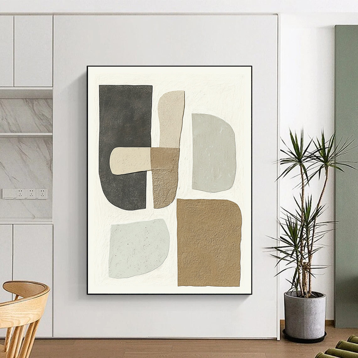 Contemporary hand-painted abstract artwork featuring minimalist shapes in soft gray beige and brown tones on a white background highlights unique textured forms. DLZ1344