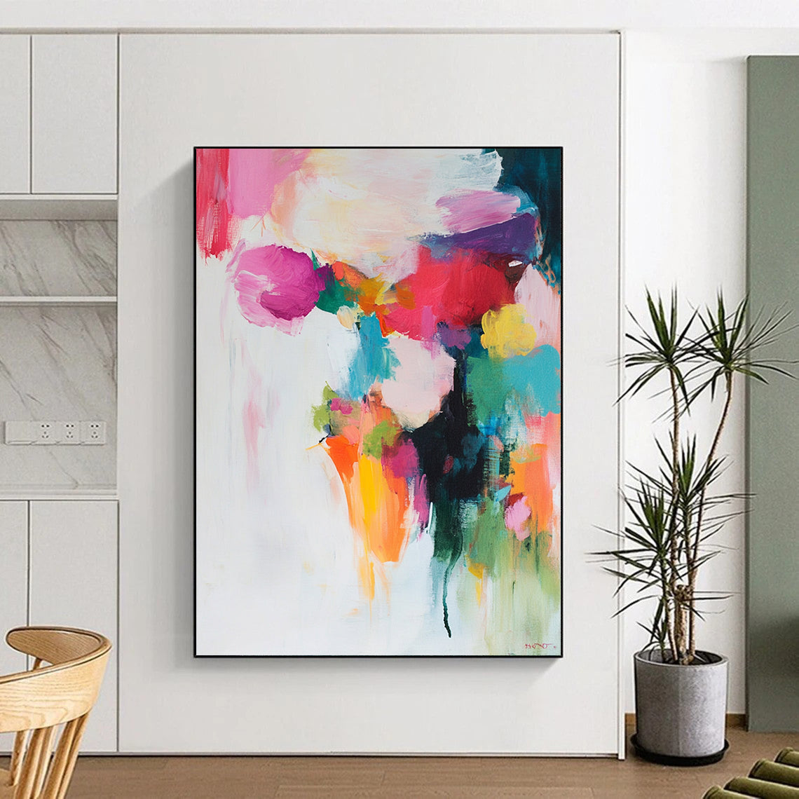 Contemporary abstract painting features soft colors in brush strokes and shapes on a white background with pinks reds greens yellows and blues. DLZ0687