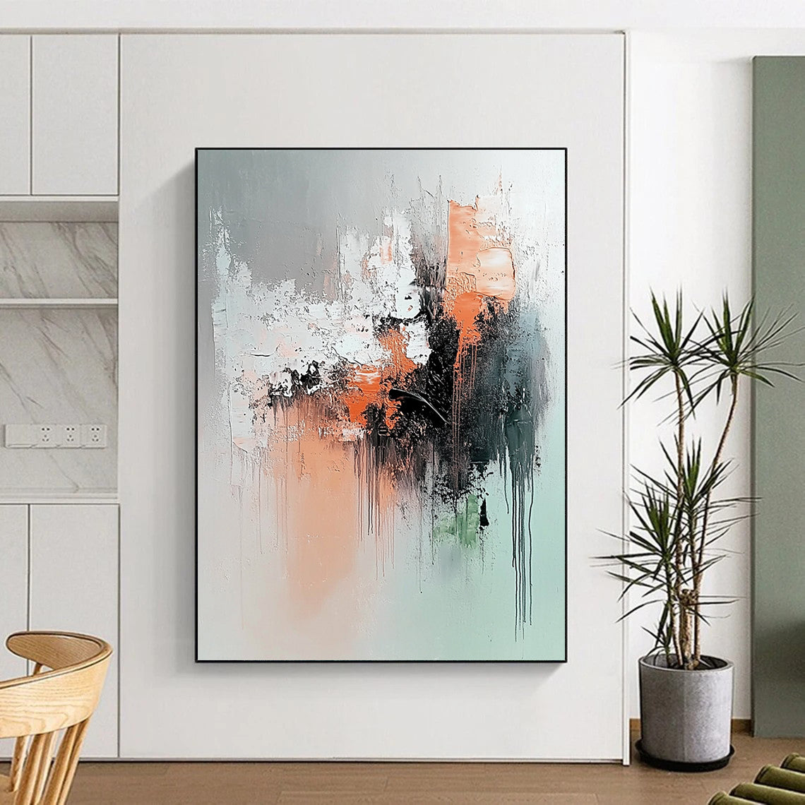 Contemporary abstract painting features soft gray peach and black colors with a serene explosion of dark green rust orange and brown elements. DLZ1054