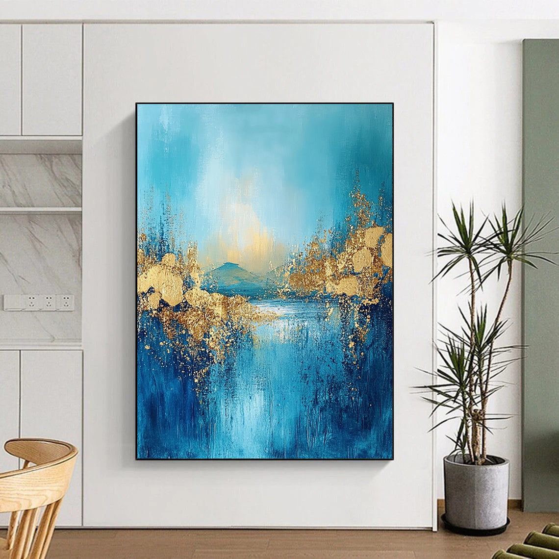 Contemporary large abstract painting features textured fringe with a landscape illuminated by golden light and adorned with gold foil accents. DLZ0345
