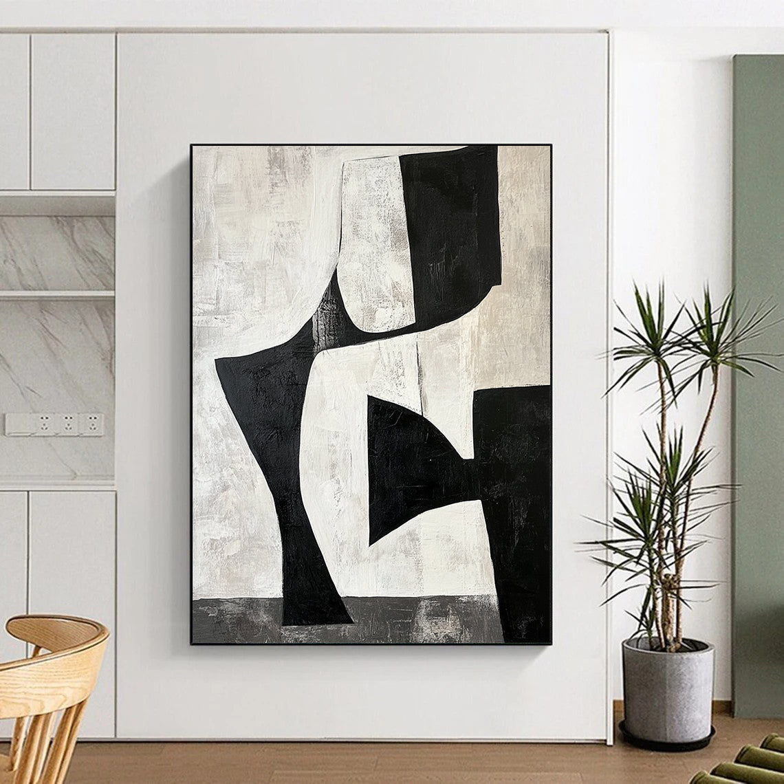 Contemporary hand-painted abstract artwork featuring black and white shapes creating negative space resembling legs against a gray-toned background. DLZ1392
