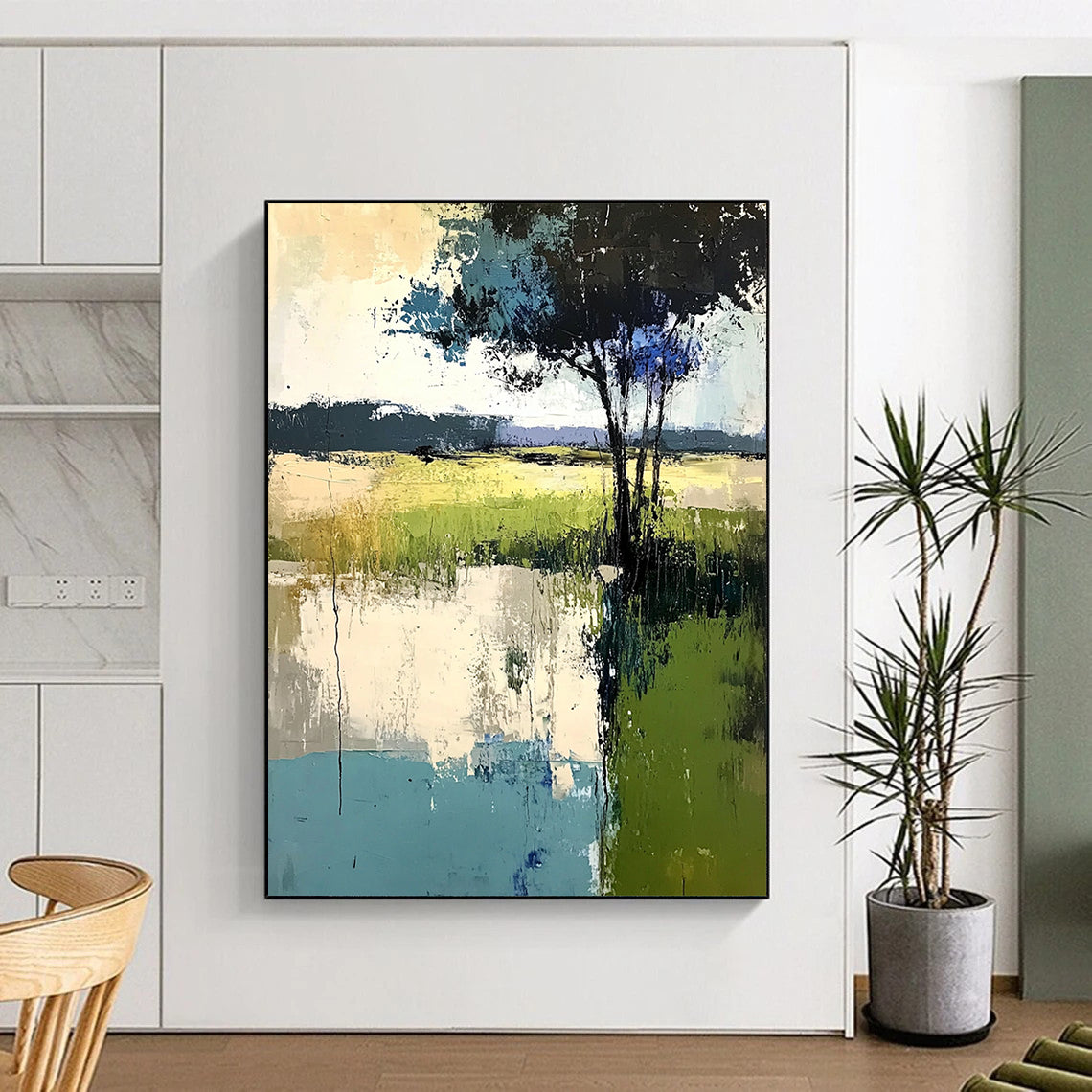 Contemporary abstract painting featuring soft edges trees and grass in muted greens blues and grays created with thick brush strokes and palette knife techniques. DLZ0419