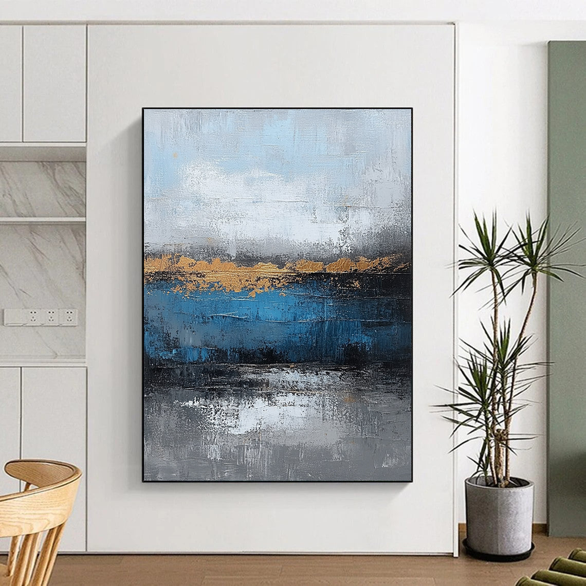 Contemporary large hand-painted abstract artwork featuring blue and gray textures with gold leaf accents on canvas for a striking wall display. DLZ0346