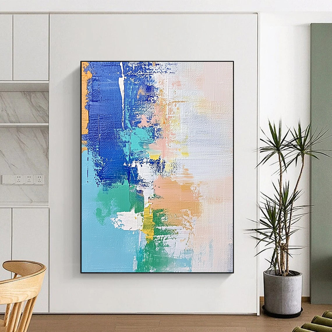 Contemporary hand-painted abstract artwork features soft pastel shades of blue and white with hints of green and beige, enhanced by dynamic brush strokes and mixed media. DLZ0657