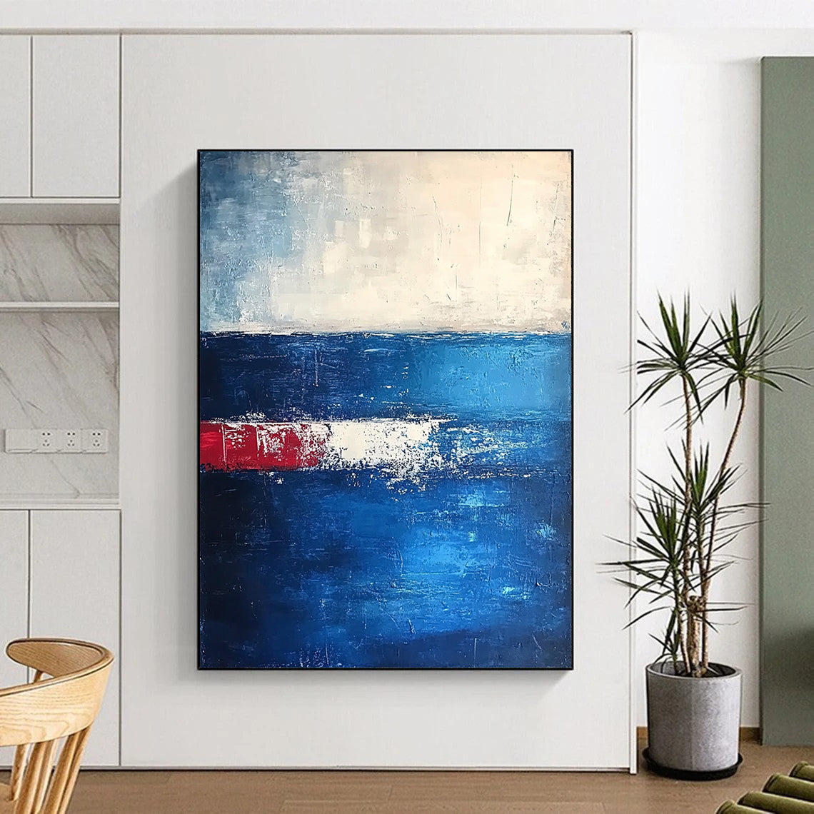 Modern abstract artwork featuring deep blues and dark grays with thick textured brushstrokes creating an atmospheric horizon in a serene minimalist composition. DLZ0365