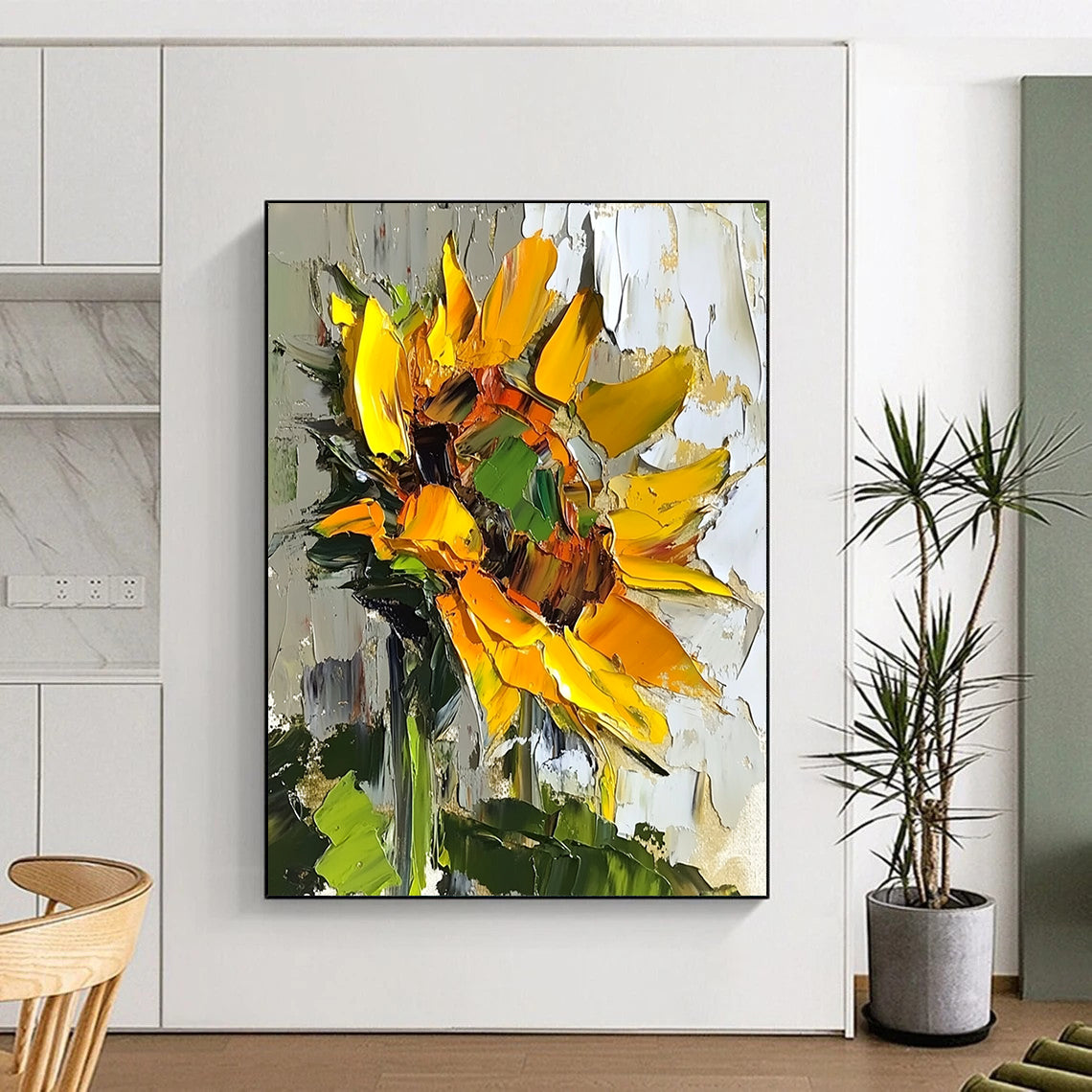 Vibrant abstract sunflower oil painting with bold brush strokes and textured surface in natural light against a soft green leaf backdrop. DLZ1664