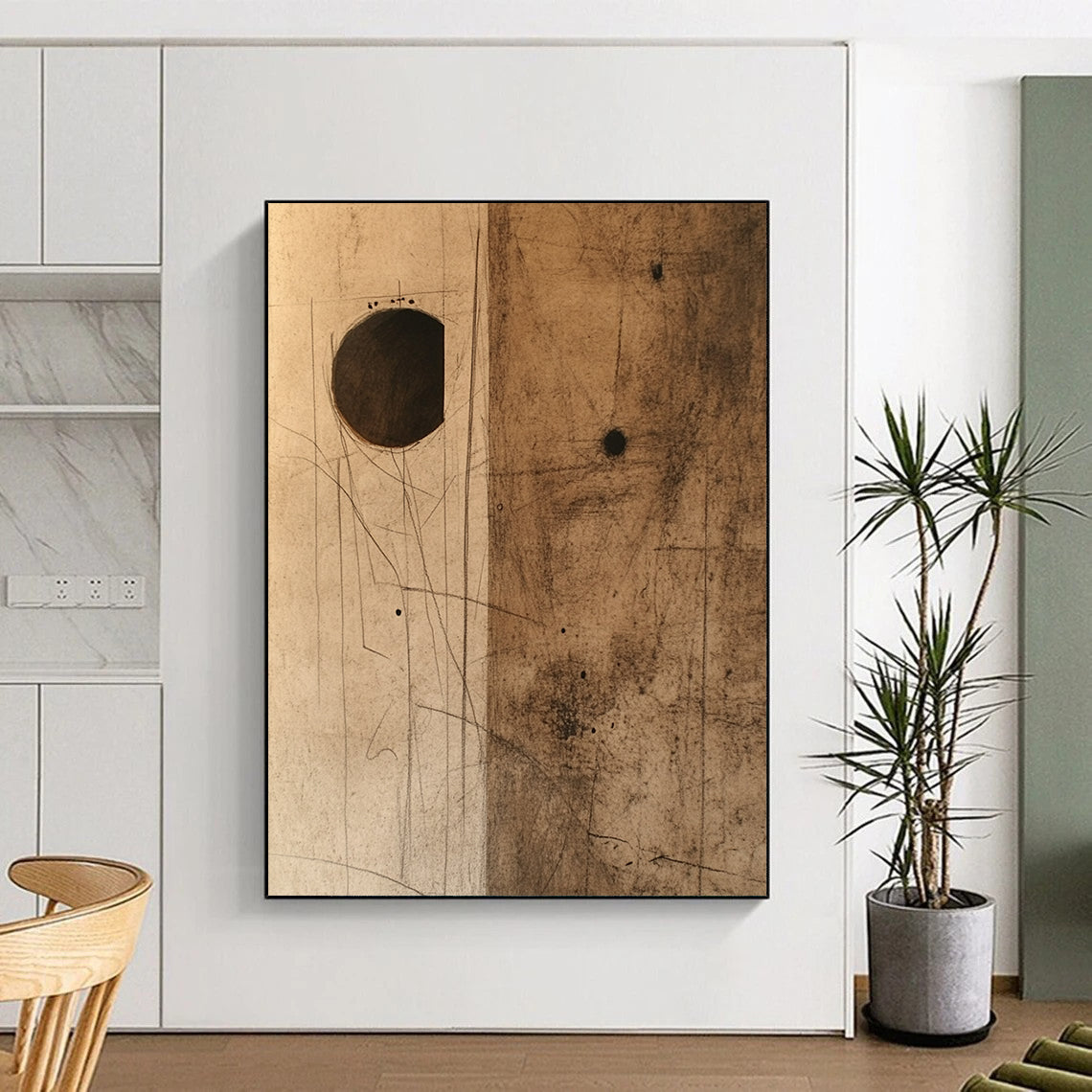 Contemporary hand-painted abstract art features textured brown paper with dark stains and a small hole, complemented by a striking cardboard piece. DLZ1089