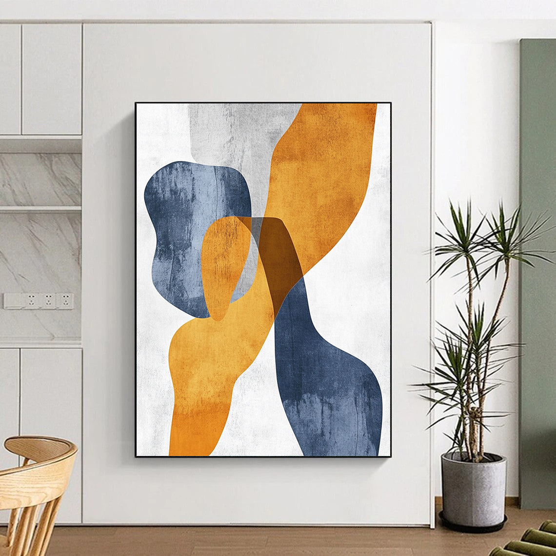 Contemporary hand-painted abstract art featuring organic shapes in mustard yellow and bluish-grey with touches of burnt orange on textured paper. DLZ0501