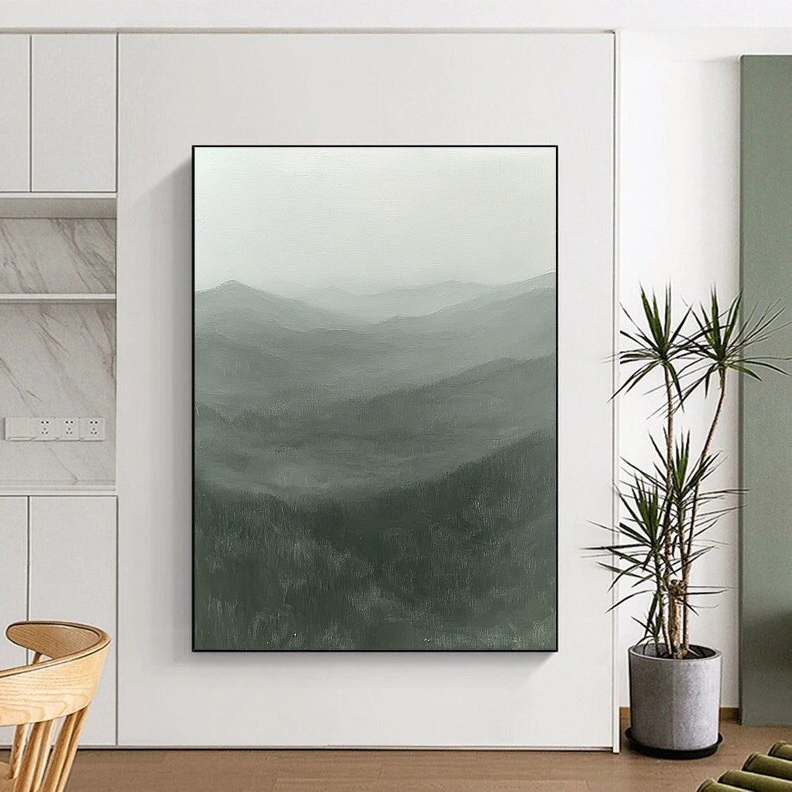 Contemporary hand-painted abstract artwork showcasing misty rugged mountains in serene greens and grays with an ethereal light, inviting solitude and mystery. DLZ0845