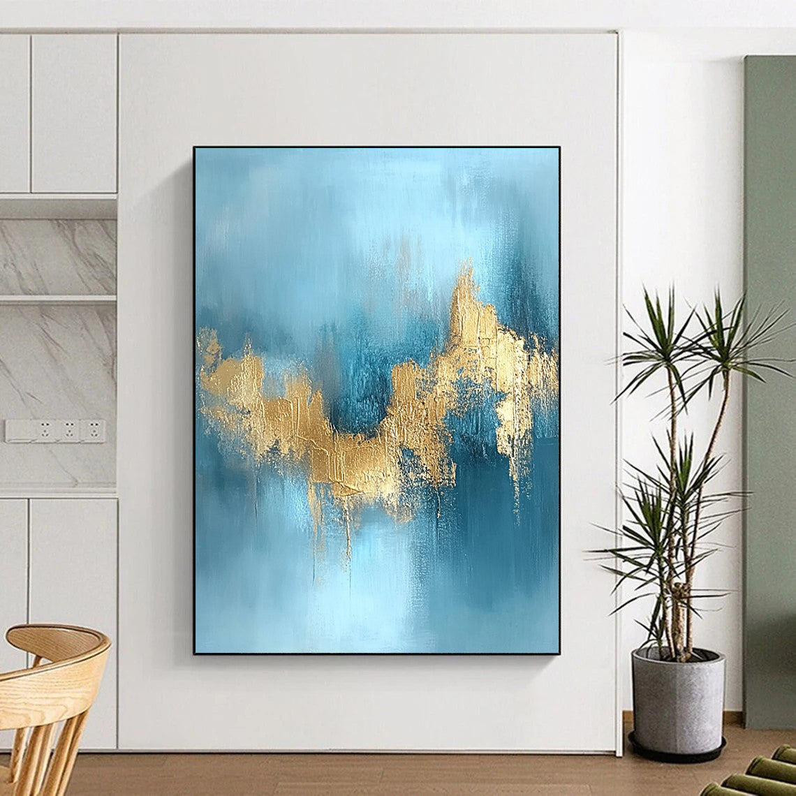 Contemporary hand-painted abstract art featuring a serene water and sky blue backdrop adorned with stunning gold foil textures. DLZ0723