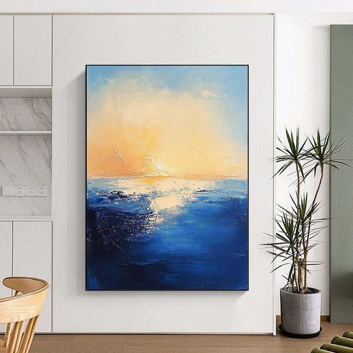 Contemporary abstract painting features textured navy ocean waves against a serene pastel sky and warm sun creating a mysterious atmosphere. DLZ0366