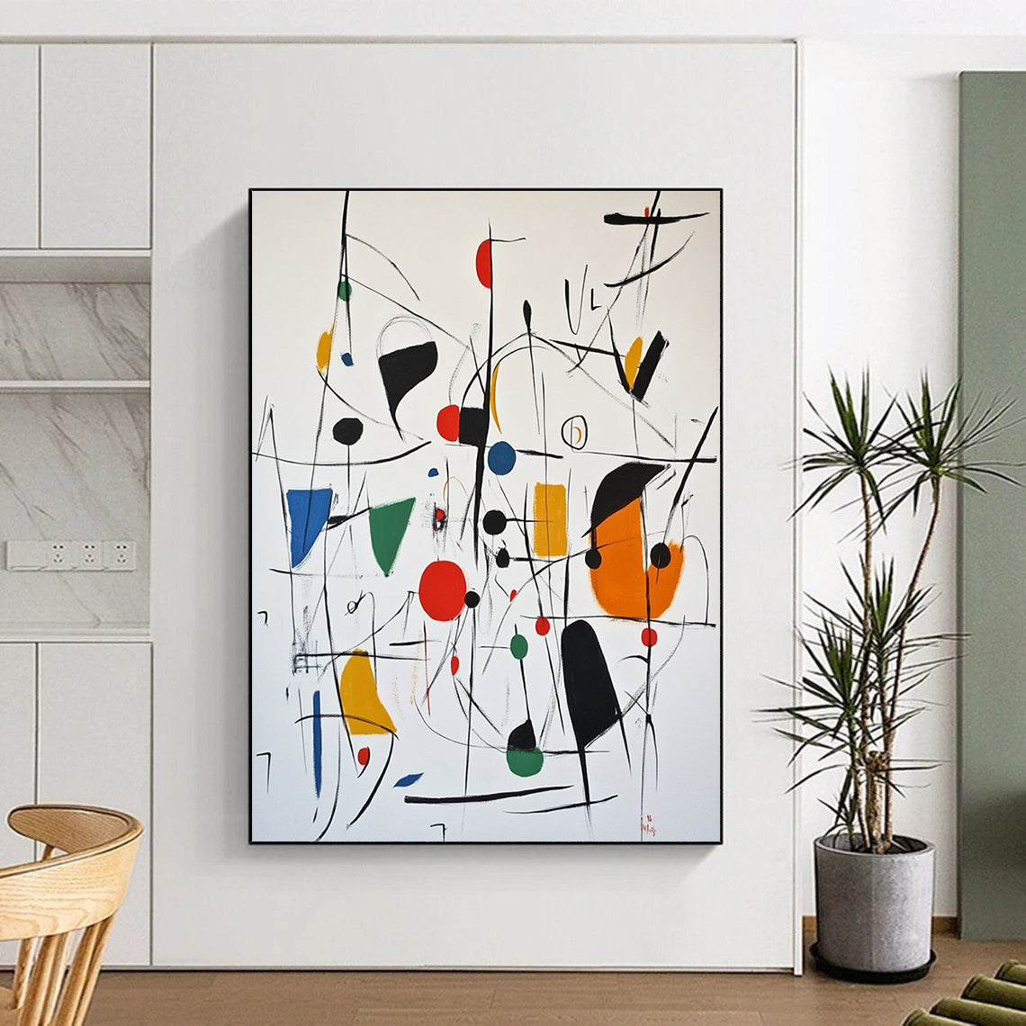 Contemporary abstract artwork featuring expressive shapes in vibrant colors with black red circles green blue squares and dynamic lines evocative of Joan Miró's style. DLZ1511