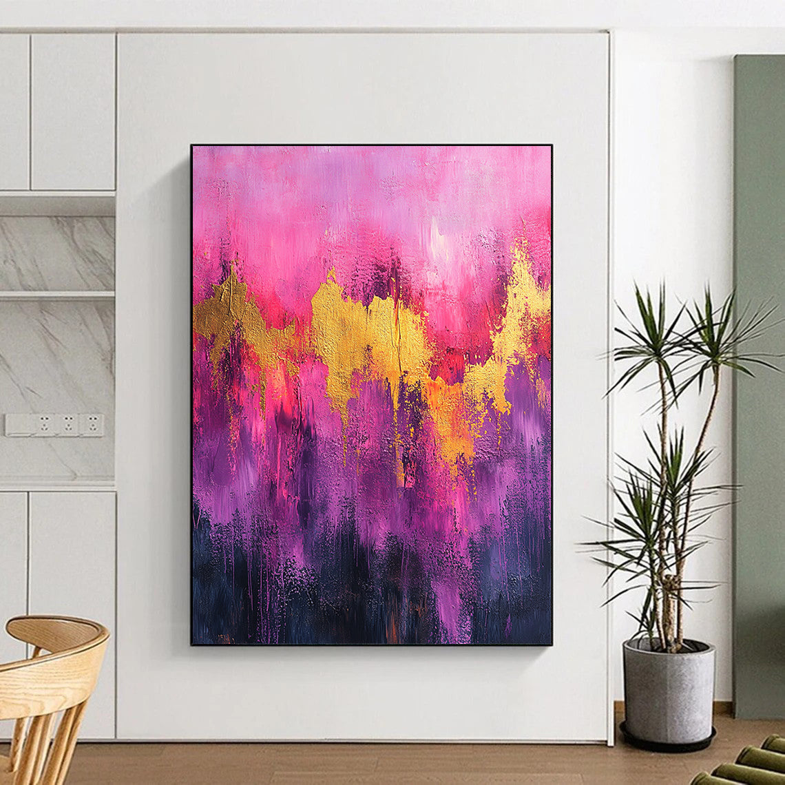Contemporary abstract artwork featuring vibrant pink and purple tones with gold accents and dynamic splatter drips on textured canvas. DLZ0909