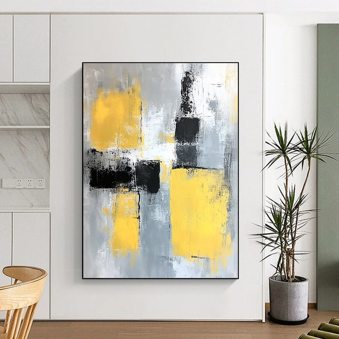 Contemporary abstract painting featuring gray and yellow color blocks with soft edges and dynamic brush strokes on a large canvas. DLZ0522