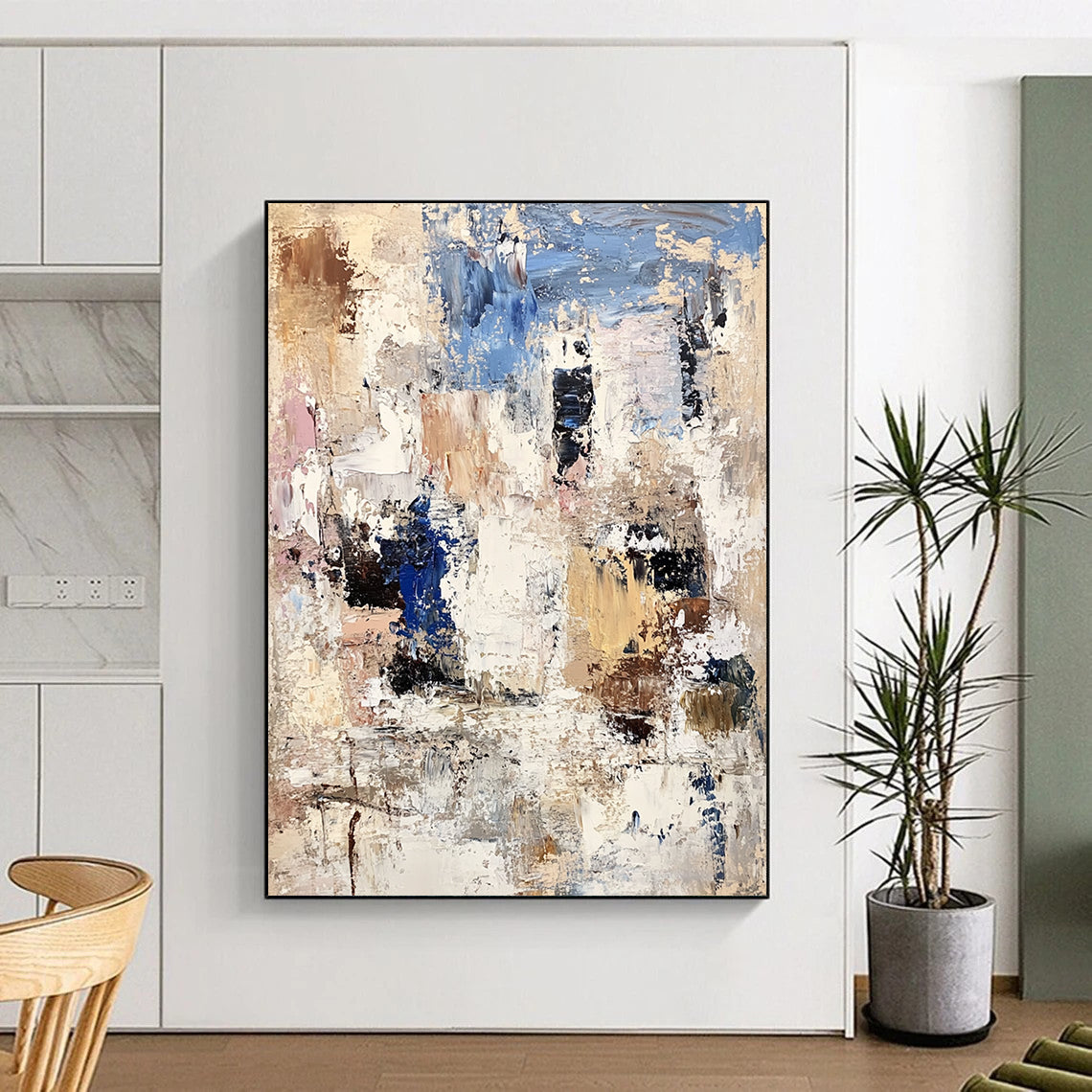 Contemporary abstract artwork showcasing textured white rocks and buildings with bold brushstrokes in beige, brown, blue, and gray. DLZ0898