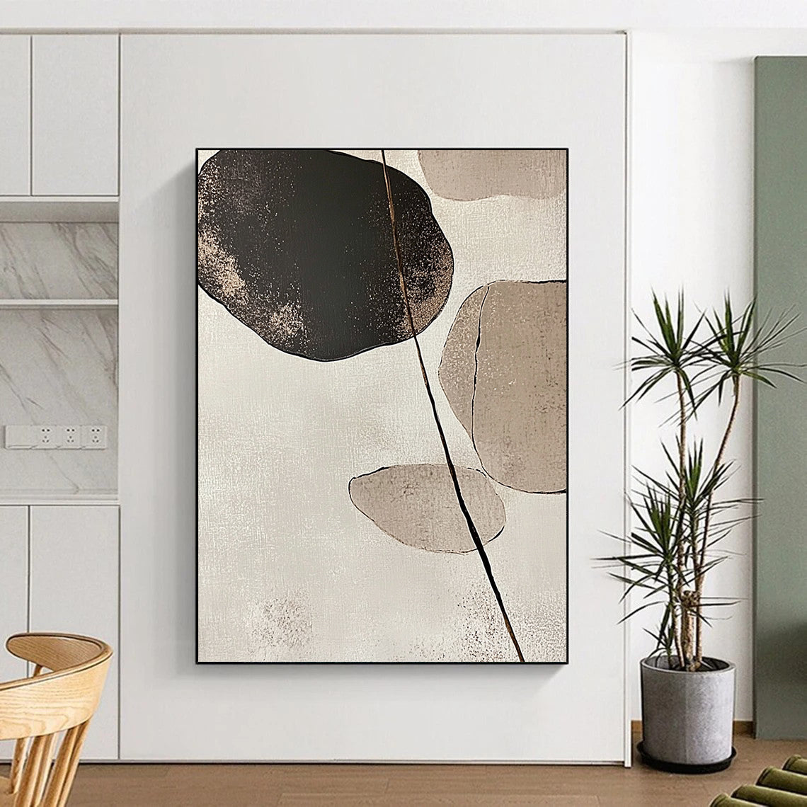 Large contemporary abstract art featuring minimalist Japandi design with stone and leaf forms in beige and neutral tones against a white background. DLZ1616