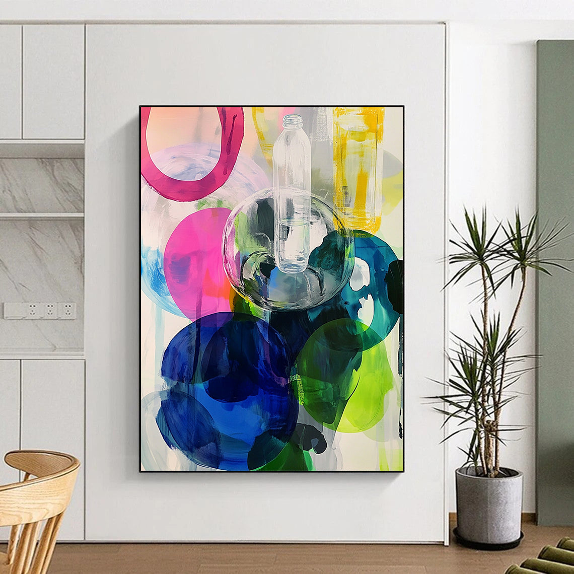 Contemporary abstract artwork featuring large round shapes in vibrant pinks blues greens and yellows enhanced with transparent plastic bottles. DLZ0984
