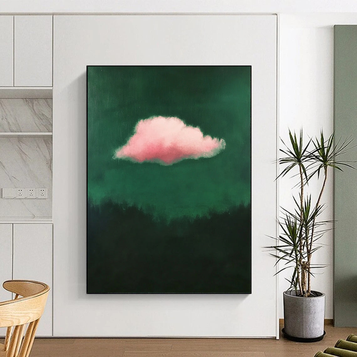 Contemporary minimalist art featuring a single pink cloud against a dark green background exuding low contrast elegance. DLZ1682