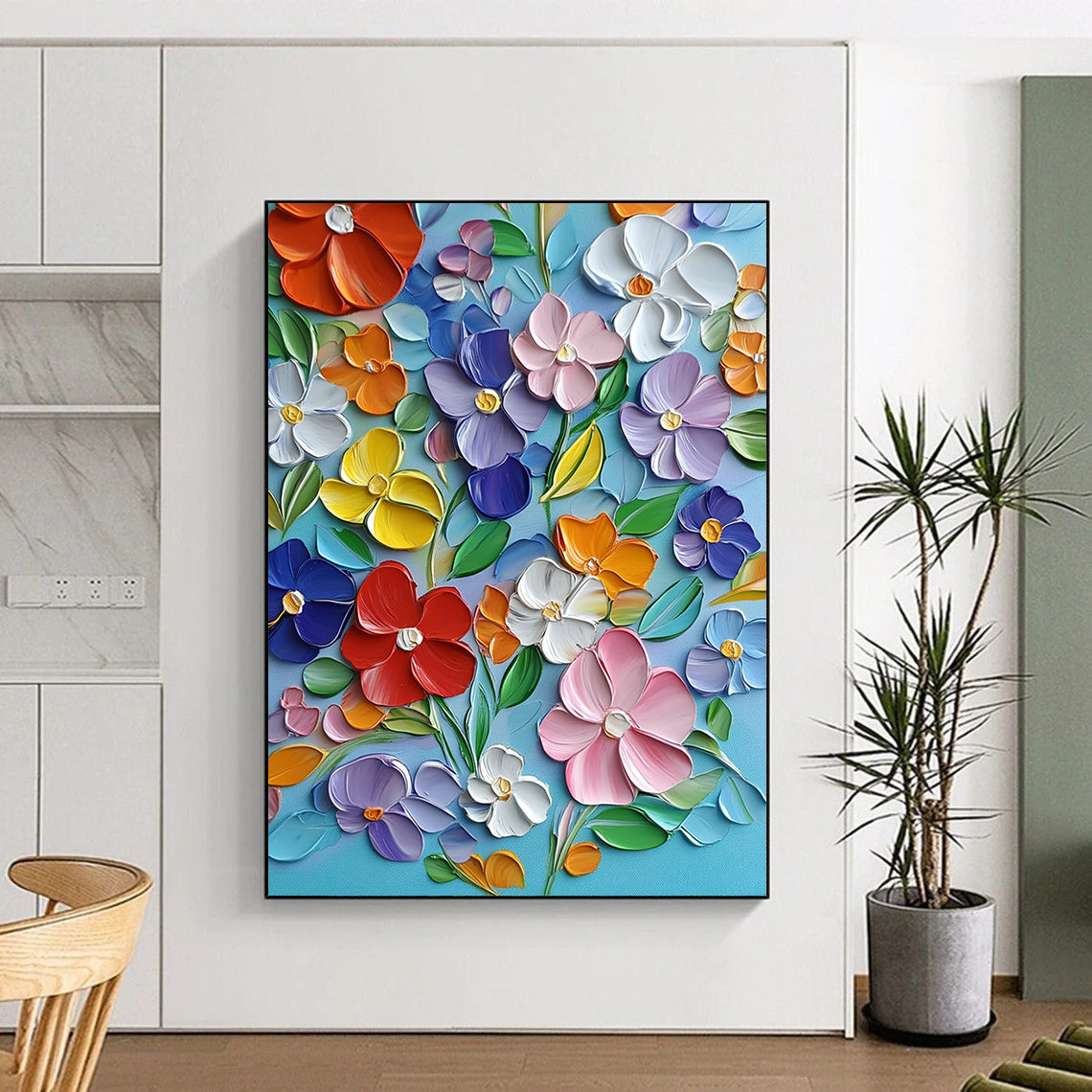 Vibrant contemporary hand-painted abstract artwork featuring blooming flowers in bold colors with textured strokes on a light blue canvas. DLZ1493