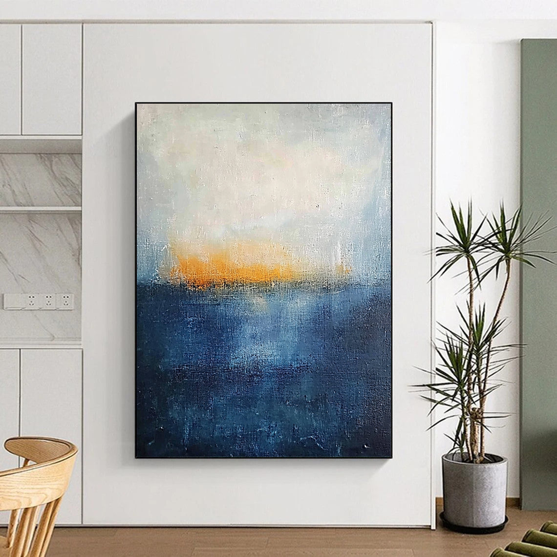 Contemporary abstract painting featuring thick textured layers in dark blue and yellow hues evoking a serene landscape with a tranquil sea and foggy horizon. DLZ0356