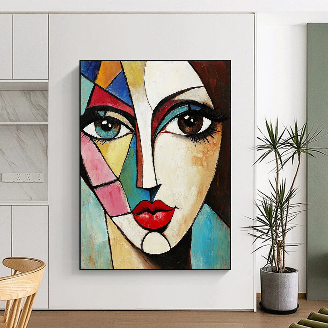 Contemporary abstract painting featuring a woman's face with large eyes vibrant geometric shapes red lips and brown hair on a square canvas. DLZ0376