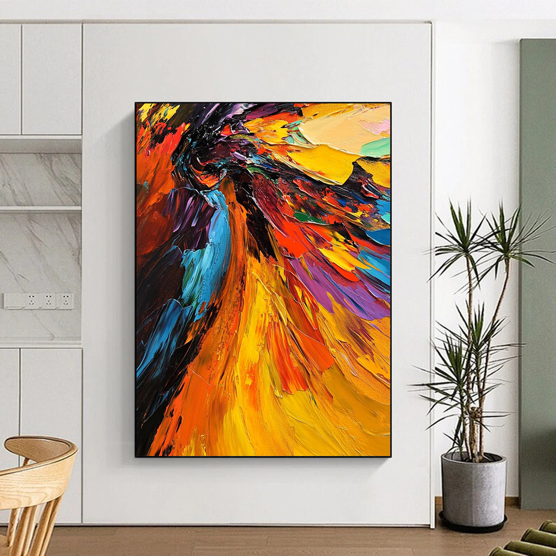 Contemporary abstract oil painting features a vivid angel with colorful wings highlighted by thick brushstrokes and dramatic lighting in a close-up view. DLZ0397