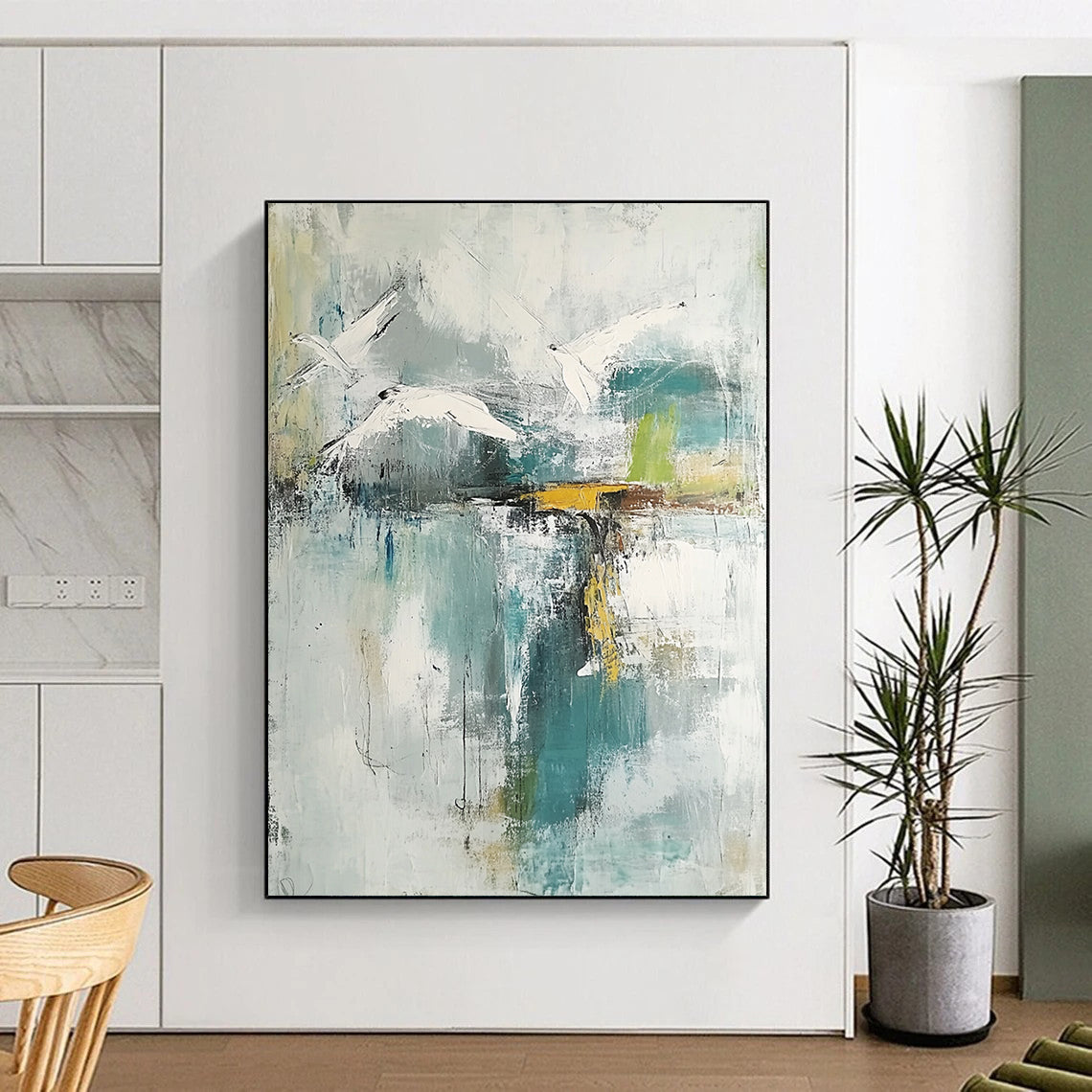 Contemporary hand-painted abstract artwork features neutral hues with teal and gold accents soft watercolors evoke birds over a lake with serene reflections. DLZ0758