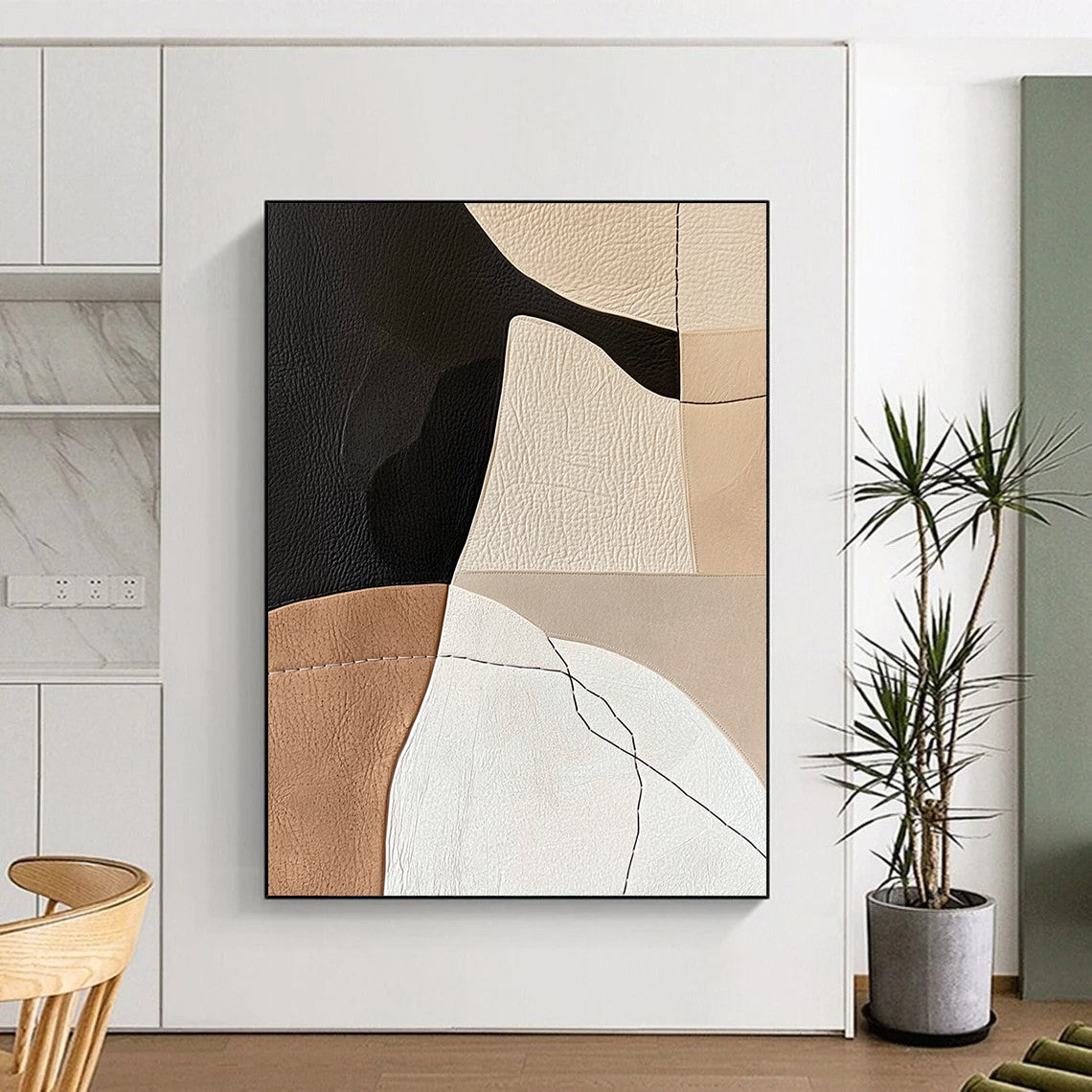 Contemporary abstract artwork with minimalist Japandi design featuring leather and paper collage in neutral earthy tones and feminine hand-stitched details. DLZ1619