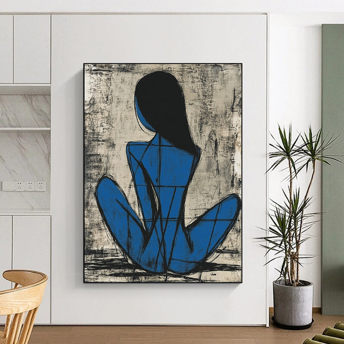 Contemporary abstract painting featuring a blue female figure in Picasso style sitting gracefully with thick lines and simple shapes on a grayish-blue background. DLZ1156