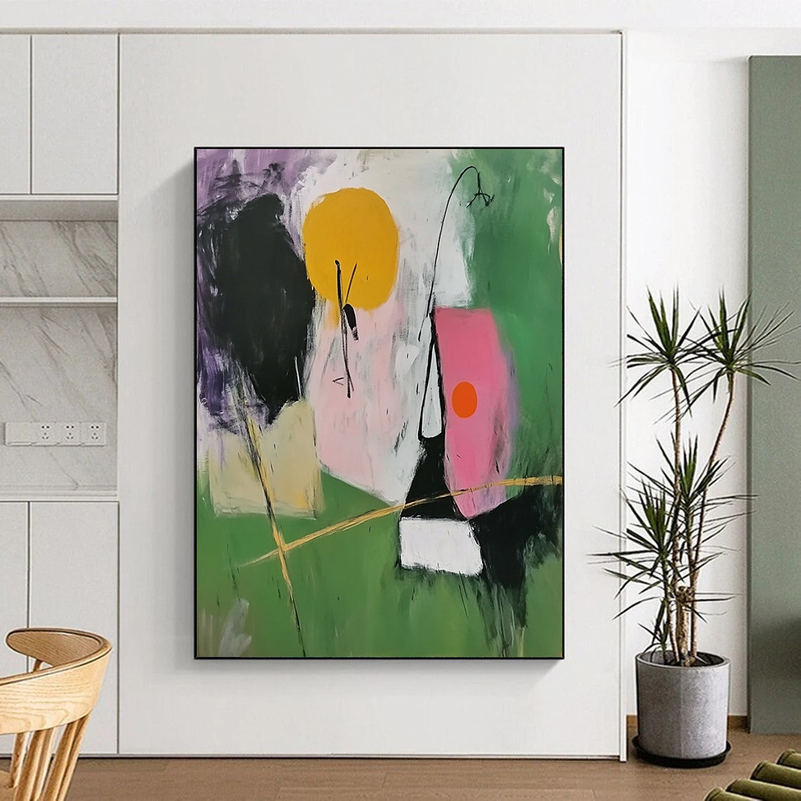 Contemporary abstract painting featuring simple shapes in green and pink with black lines and a central figure holding golden sticks. DLZ0683