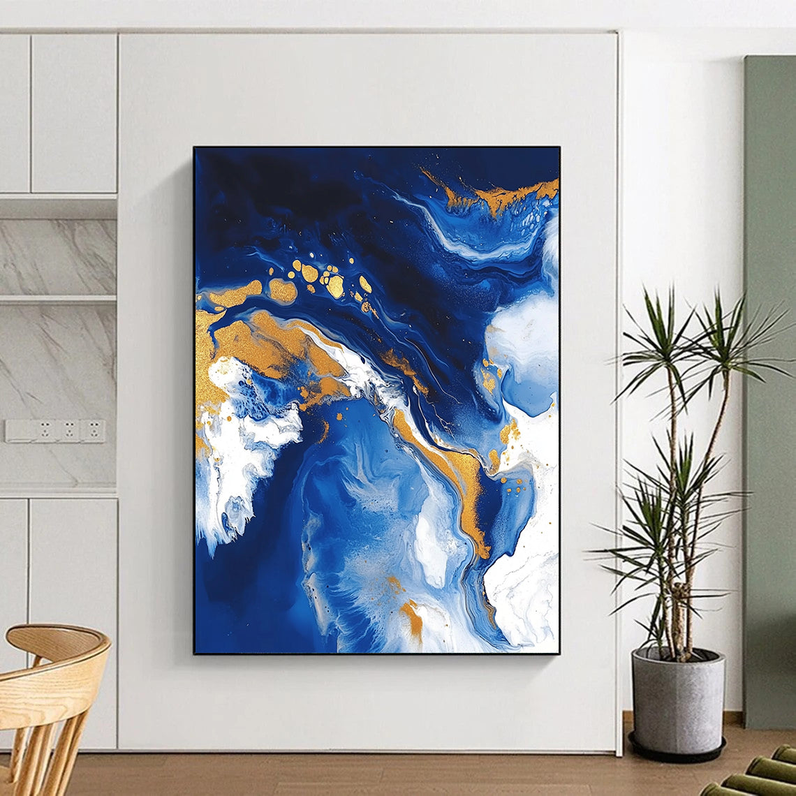Contemporary abstract artwork featuring fluid acrylic swirls in blue and gold with textures of ocean waves white clouds and glitter accents. DLZ0327