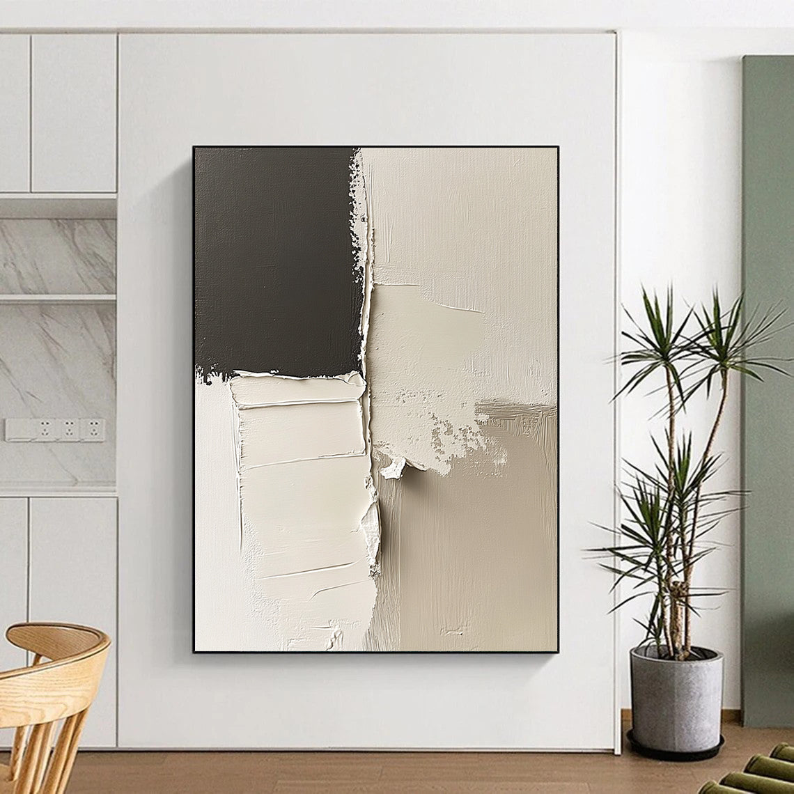 Contemporary abstract artwork features striking black and white impasto shapes and minimalist lines on a canvas with deconstructed paper elements in neutral tones. DLZ0524