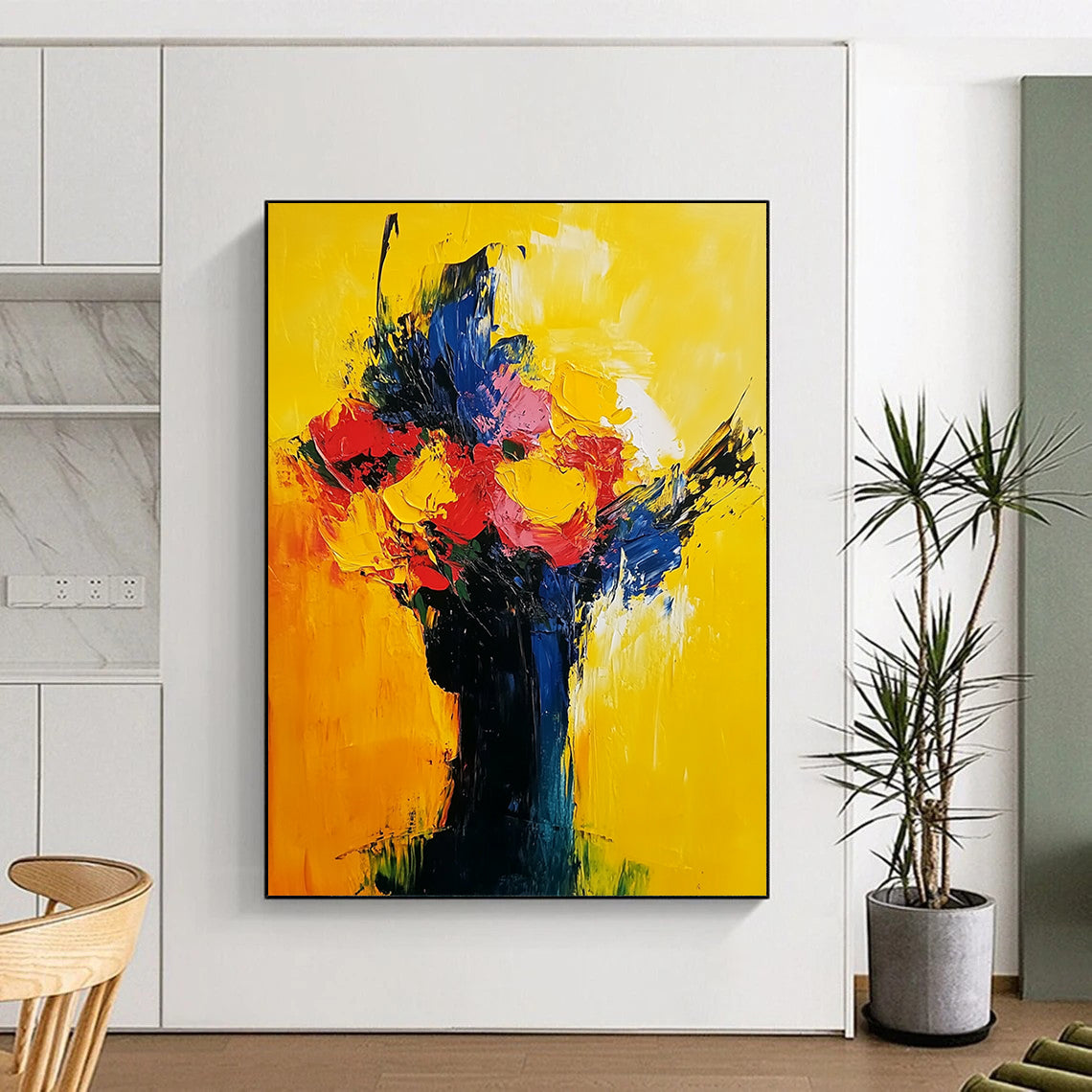 Contemporary abstract painting in vibrant yellow red and blue showcasing expressive flowers and a sunrise with visible brush strokes on oil canvas. DLZ0542
