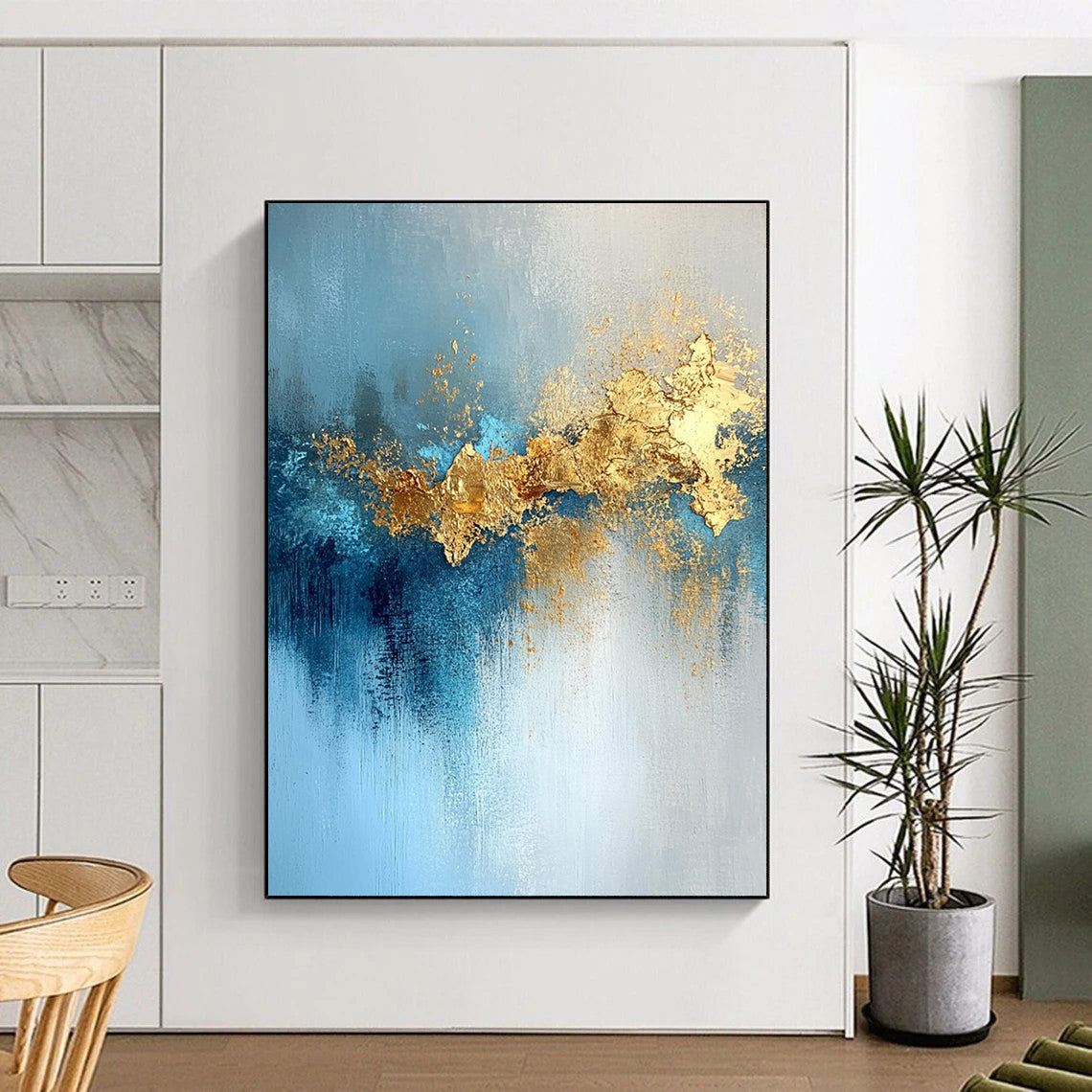Contemporary hand-painted abstract artwork featuring gold leaf, soft light, blue tones, atmospheric clouds, and a mysterious shimmering texture. DLZ0336