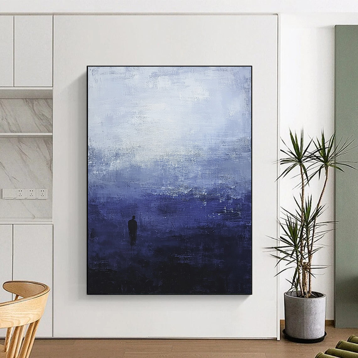 Contemporary hand-painted abstract art featuring atmospheric dark blue and grey sky tones with a solitary silhouette evoking tranquility and isolation. DLZ0513