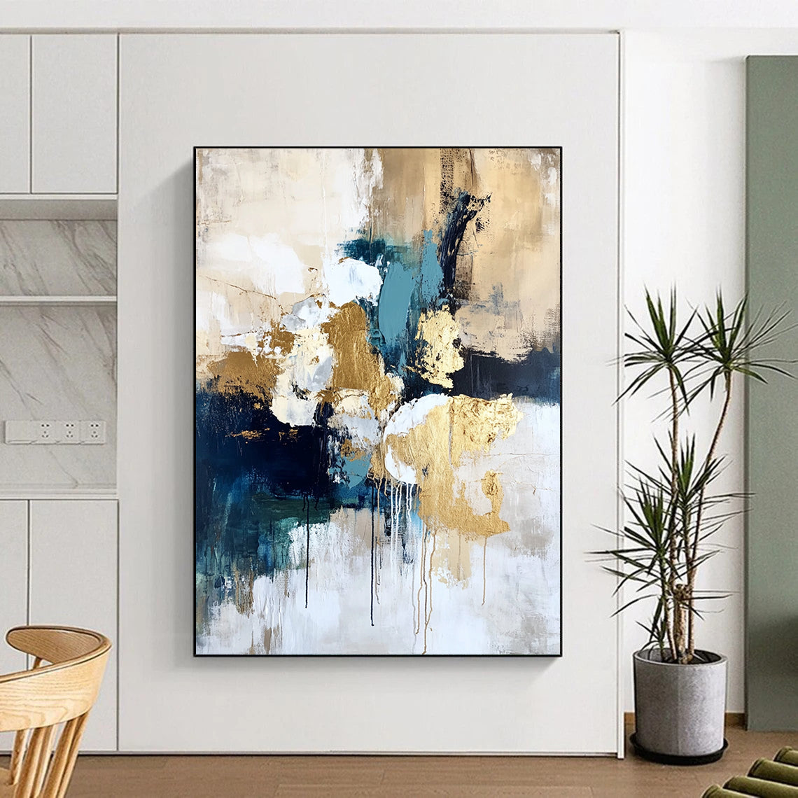 Contemporary hand-painted abstract art on textured canvas with gold foil highlights in cream white and blue creating a romantic atmosphere with vibrant earthy tones. DLZ1009