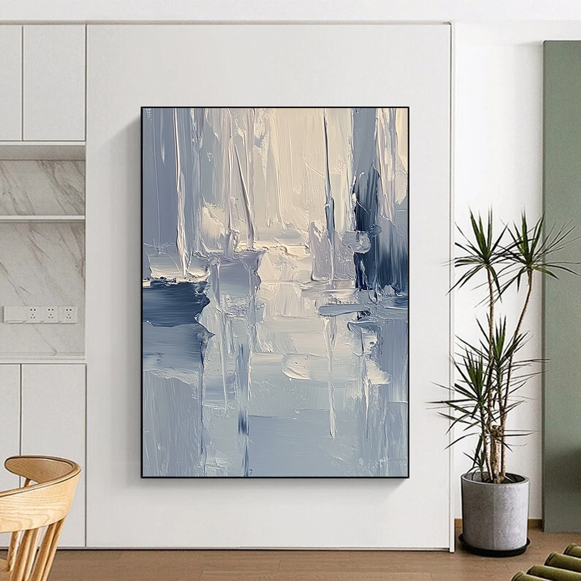 Large contemporary abstract painting featuring textured layers of blue and gray tones with soft lighting reflecting a serene coastal landscape. DLZ0352