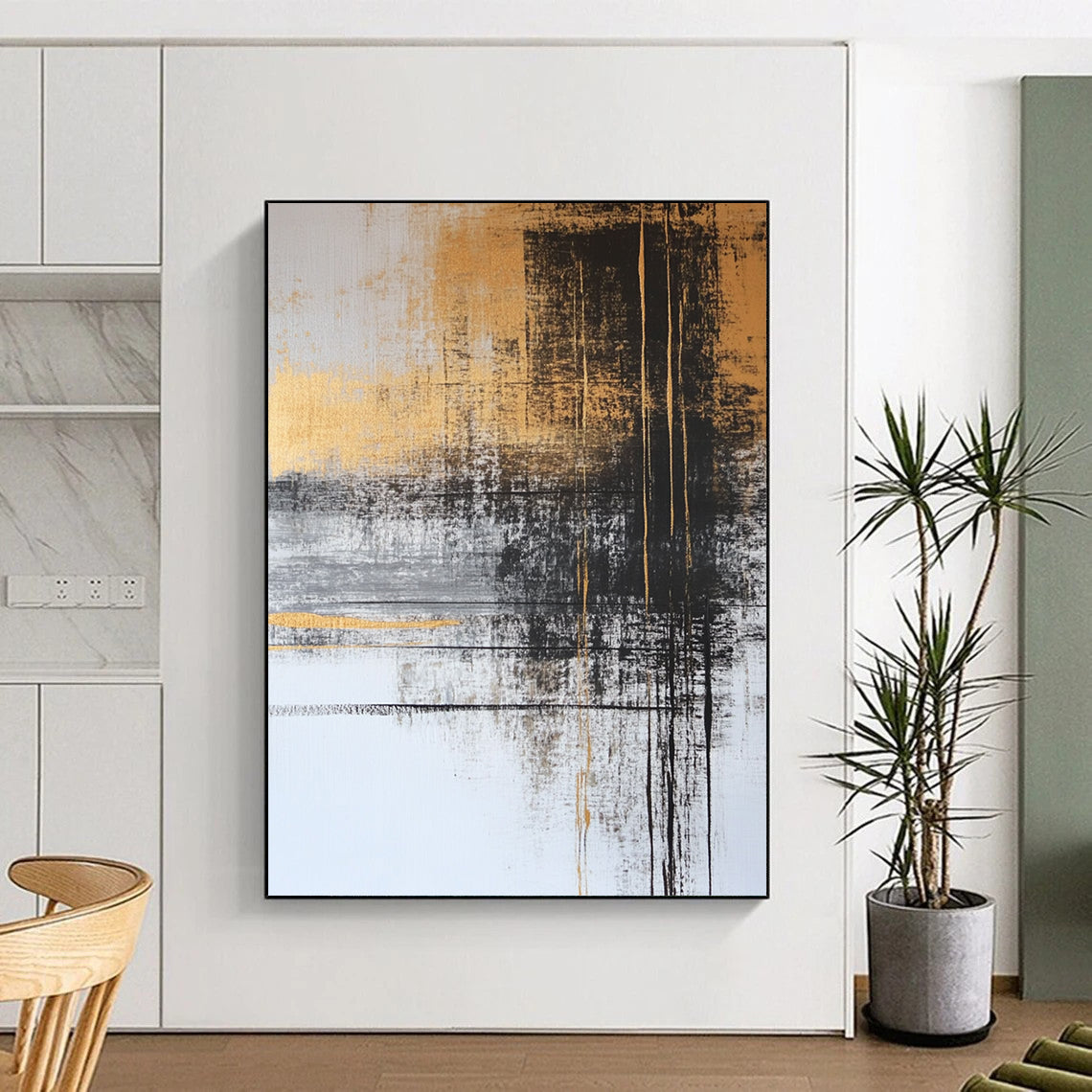 Contemporary abstract painting with gold and gray tones features black ink lines and serene water imagery, adorned with delicate plant figures for a tranquil feel. DLZ1273