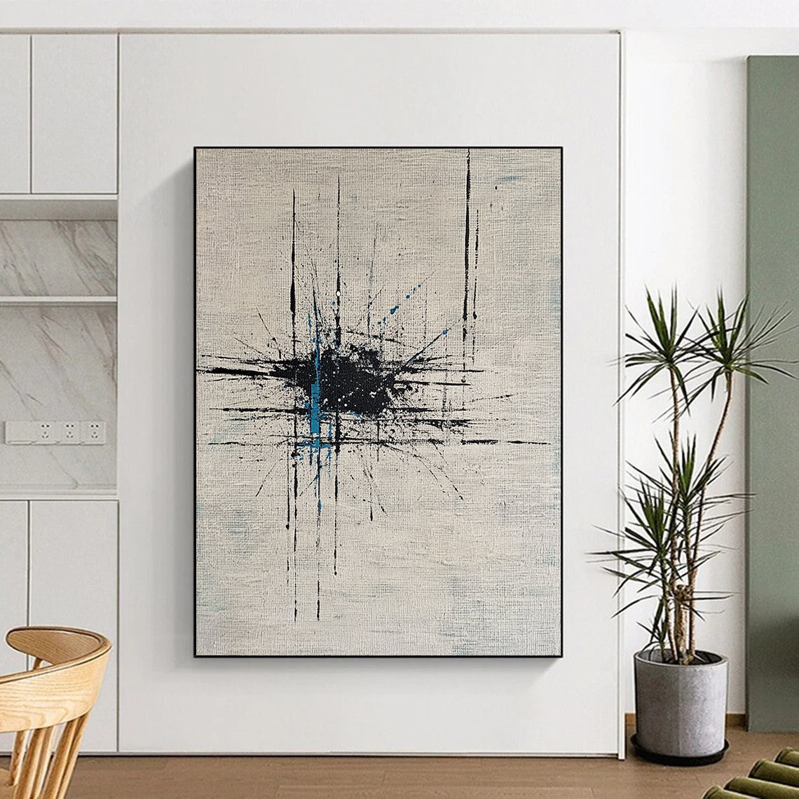 Contemporary hand-painted abstract artwork featuring dynamic lines and dots on white canvas enhanced by bold black ink and vibrant blue highlights. DLZ0883