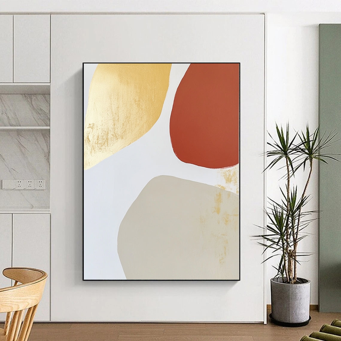 Contemporary abstract art features warm tones with an irregular oval shape, minimalist brushstrokes, and gold leafing on a light gray background. DLZ1518