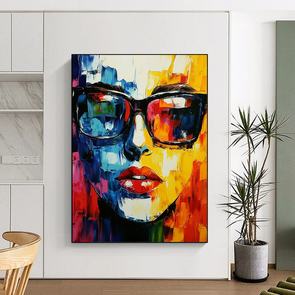 Contemporary abstract artwork featuring a vibrant face with glasses created using a palette knife technique, perfect for modern decor. DLZ0594