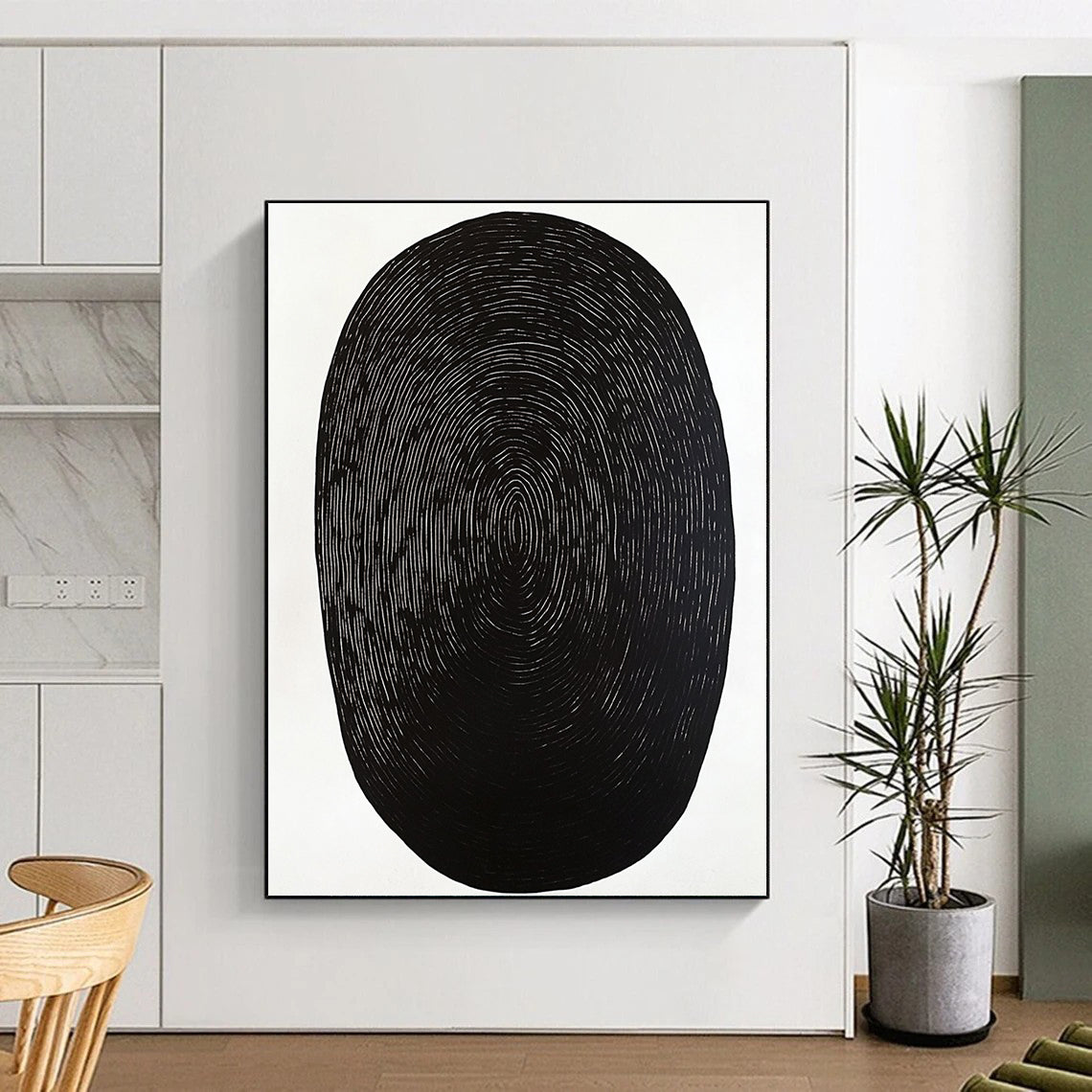 Contemporary abstract artwork featuring a black oval shape on a white background with minimal wood grain print emphasizing simplicity and elegance. DLZ1534